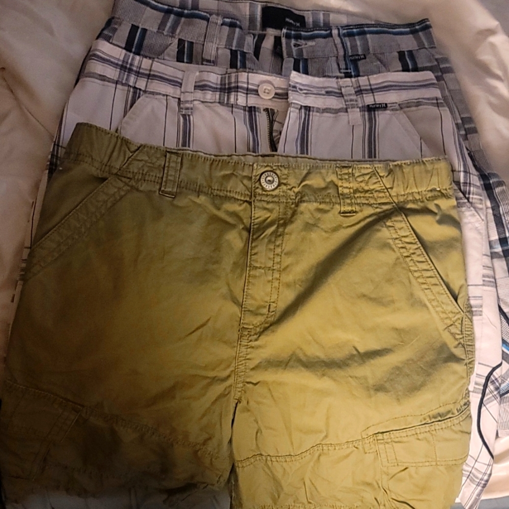 3 pairs of boys shorts.  hurley size 10 1 pair of shorts and 1 shirt gymboree